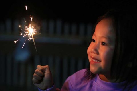 kid with sparkler