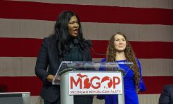  Michgian GOP Chair Kristina Karamo speaking into the microphone